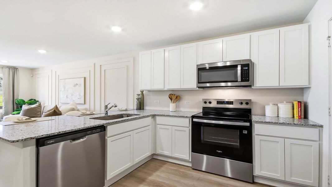 Furnished interior in a model home at Gemini in Splendora (Image 4).