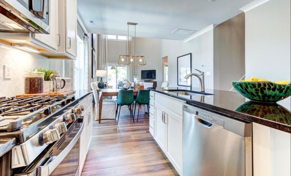 Furnished interior in a model home at CraigStone in Woodruff (Image 9).