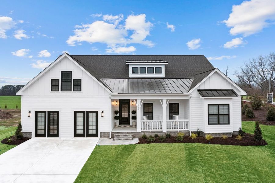 Front exterior of a home in the Turnberry community, located in Grimesland, NC (Image 11). Front exterior of a home in the Turnberry community, located in Grimesland, NC (Image 11).