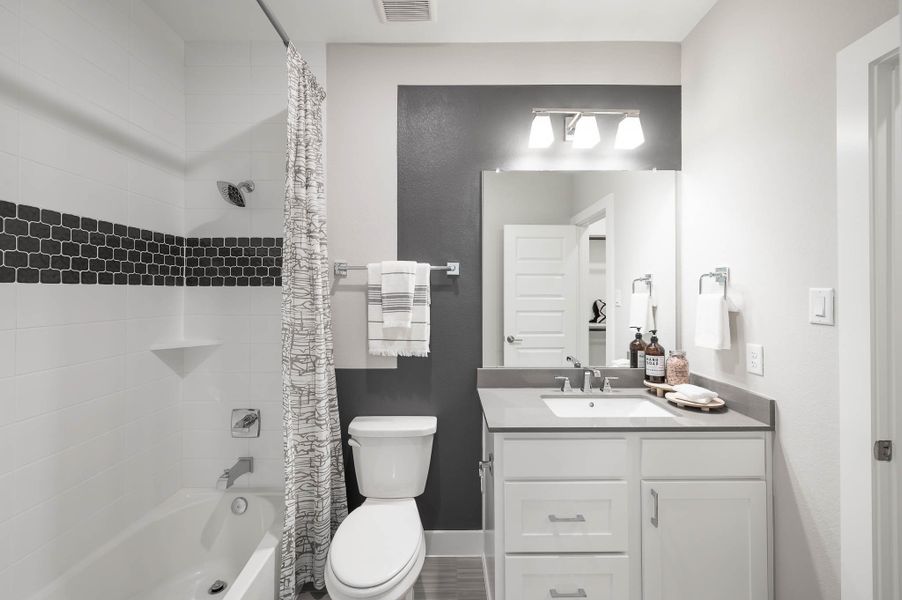 Furnished interior in a model home at Bridgeland in Cypress (Image 22).