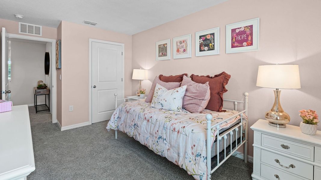 Furnished interior in a model home at Fish Lake Cove in Kissimmee (Image 26).