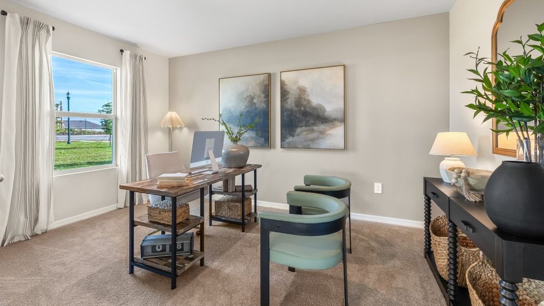 Furnished interior in a model home at Central Parc in North Port (Image 25).