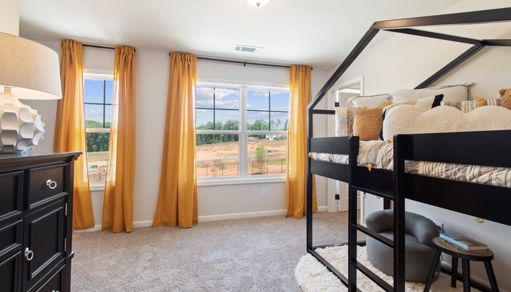 Furnished interior in a model home at Kentmere in Auburn (Image 38).