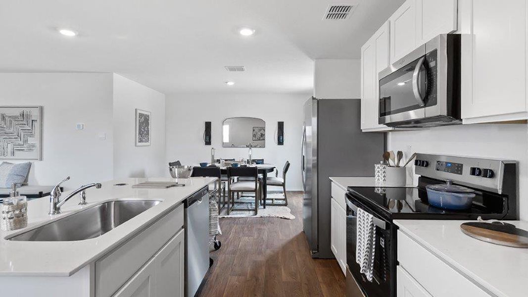 Furnished interior in a model home at Lucero in San Antonio (Image 13).