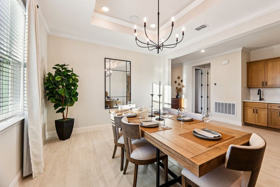 Furnished interior in a model home at Port Charlotte Premier in Port Charlotte (Image 5).