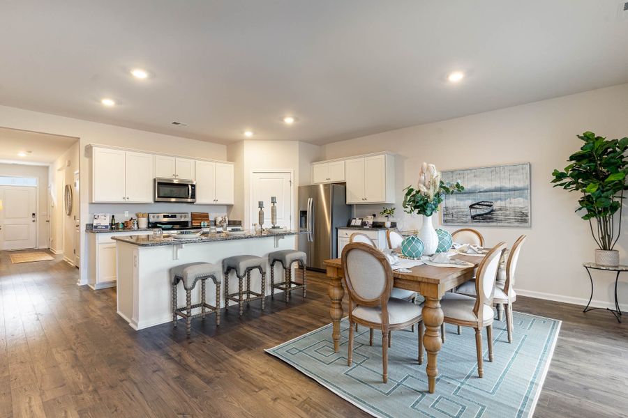 Furnished interior in a model home at Island Green in Myrtle Beach (Image 61).