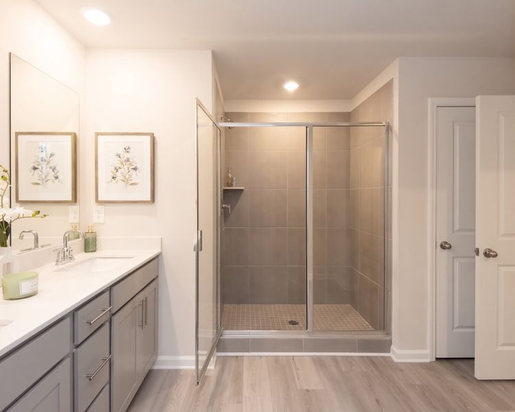 The perfect blend of function and luxury with dual sinks and walk-in shower. The perfect blend of function and luxury with dual sinks and walk-in shower.