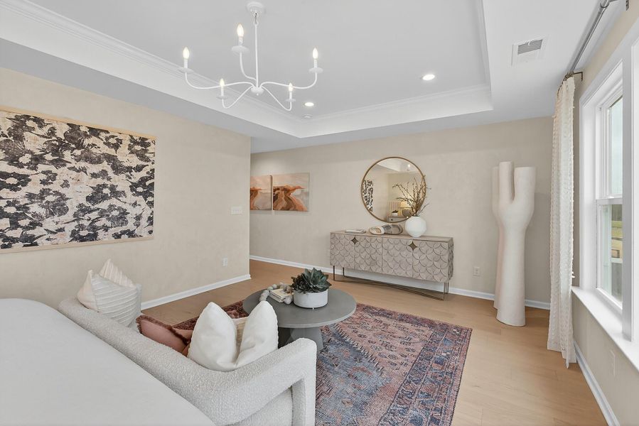 Furnished interior in a model home at Chastain in Ooltewah (Image 34).