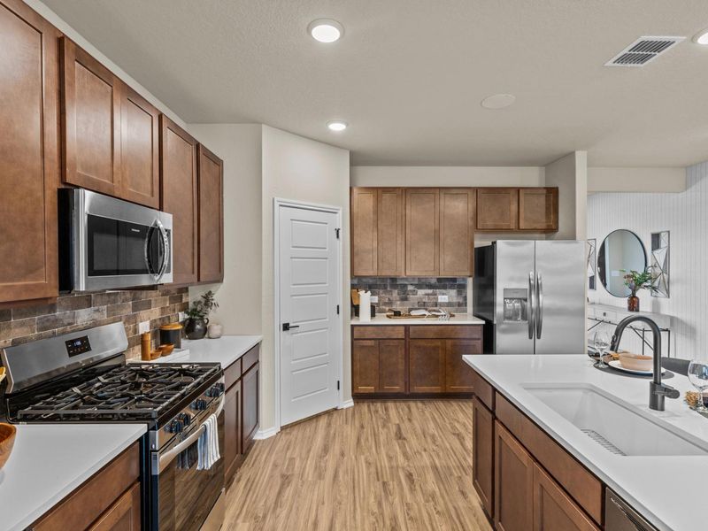 Furnished interior in a model home at Bricewood in San Antonio (Image 4).