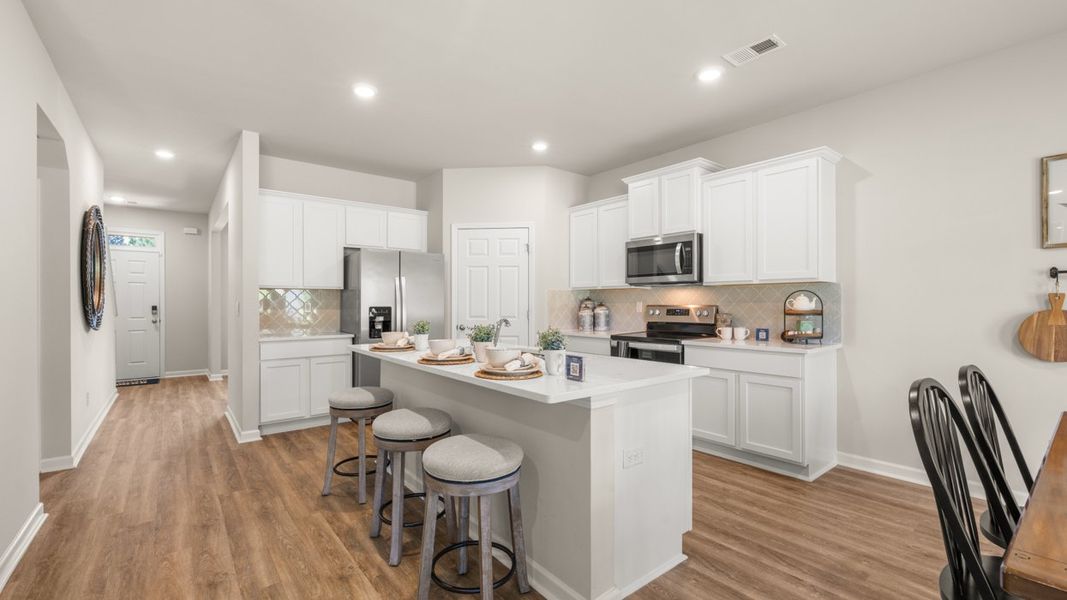 Furnished interior in a model home at Twin Lakes in Hoschton (Image 43).