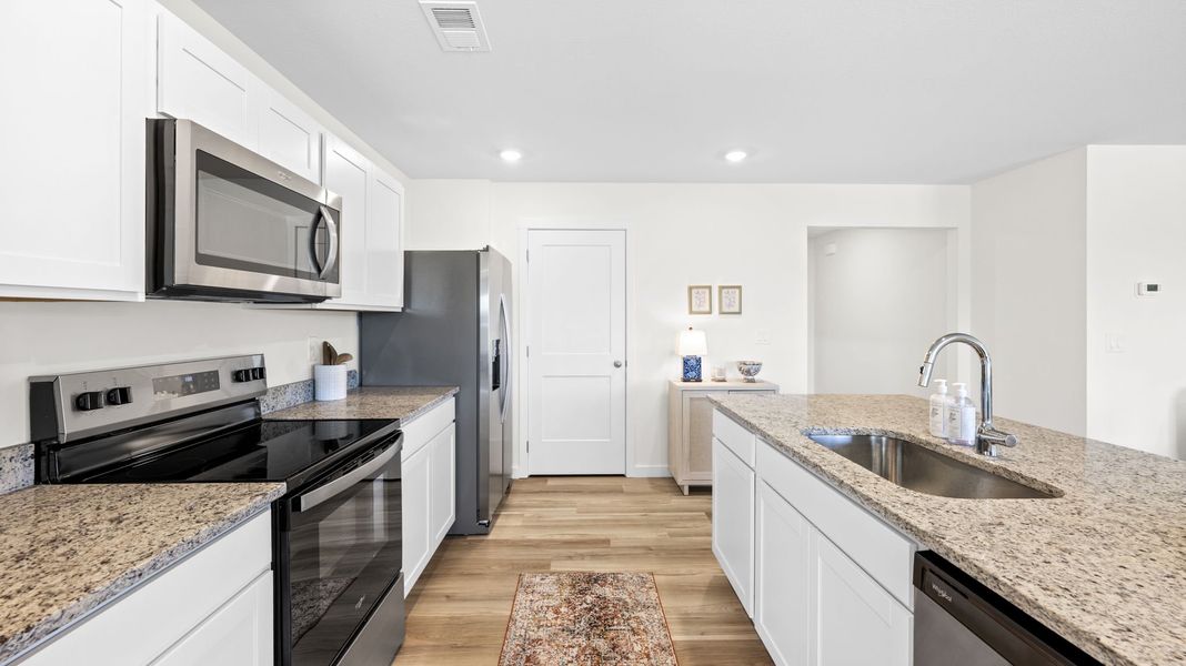 Furnished interior in a model home at Prairie Pass Express in Apison (Image 17).