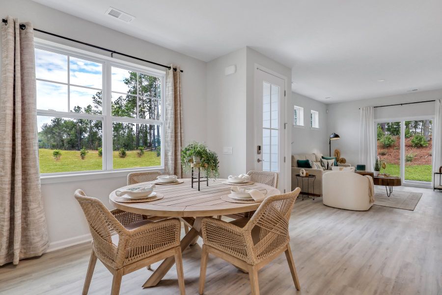 Furnished interior in a model home at Westbrook Retreat Villas at Savannah Quarters in Pooler (Image 13).