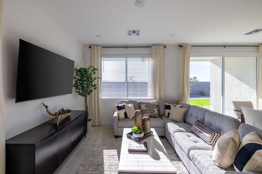 Furnished interior in a model home at Mountain View Estates Reserve Series in Buckeye (Image 5).