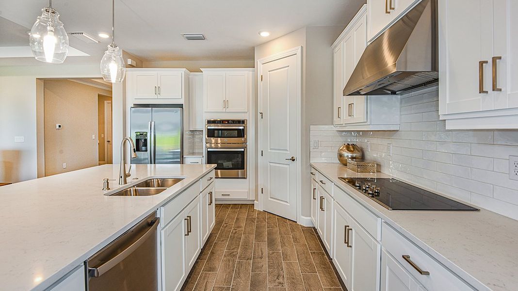 Furnished interior in a model home at Cape Coral Premier in Cape Coral (Image 6).