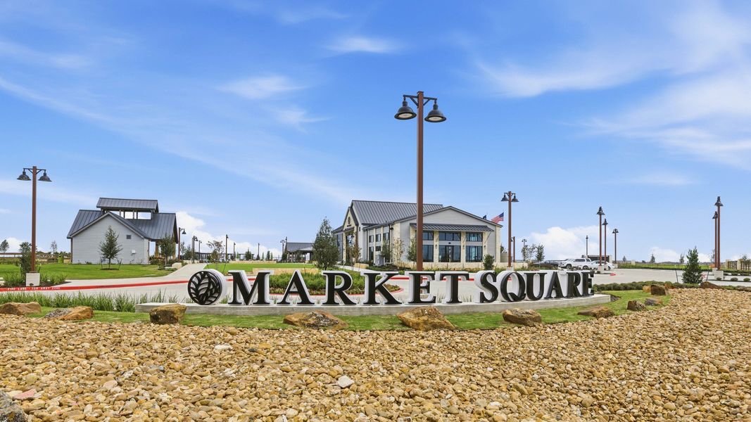 Entrance to the Flora community in Hutto, TX, featuring signage and landscaping (Image 11).