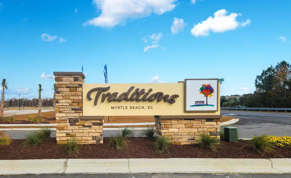 Entrance to the Traditions at Carolina Forest community in Myrtle Beach, SC, featuring signage and landscaping (Image 2).