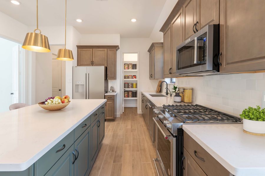 Furnished interior in a model home at Ellwood: Prestige Collection in Iowa Colony (Image 6).