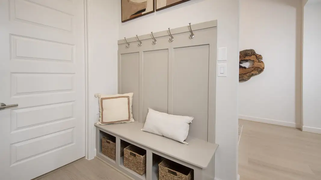 Furnished interior in a model home at The Highlands 65' in Porter (Image 23).