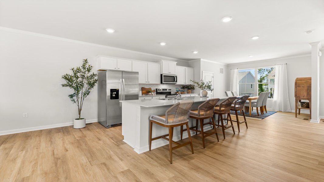 Furnished interior in a model home at Waypoint in Flowery Branch (Image 7).