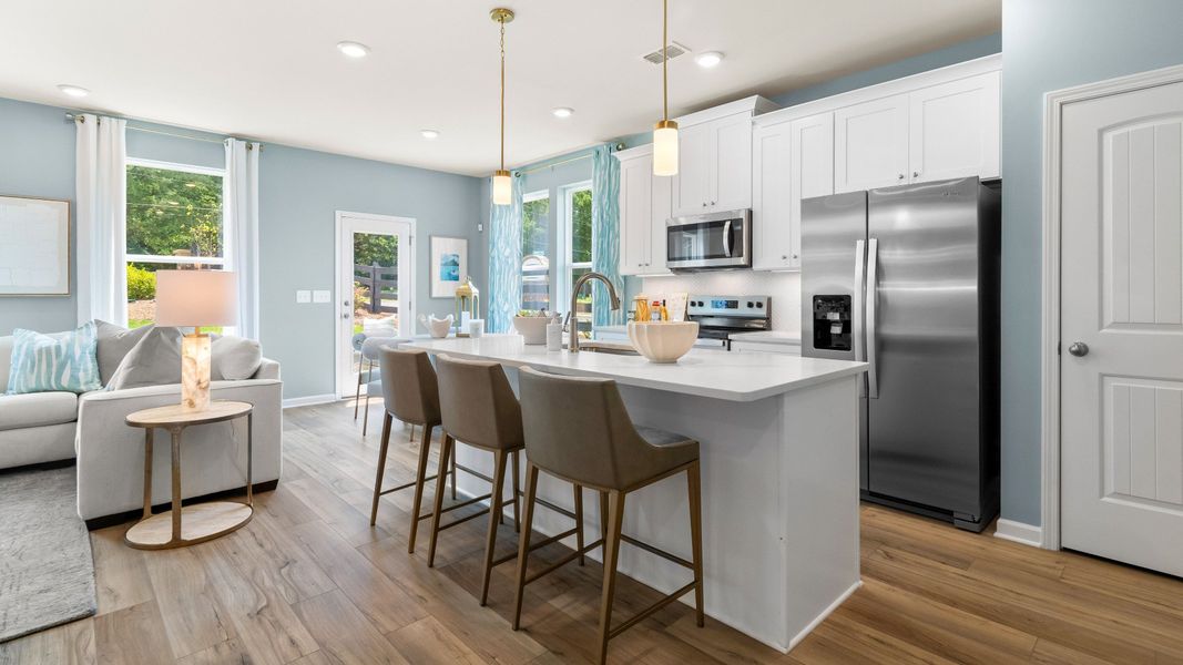 Furnished interior in a model home at McClure Farms Townhomes in Columbia (Image 4).