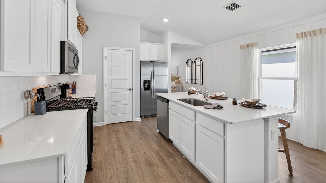 Furnished interior in a model home at Liberty Cove in Yulee (Image 11).