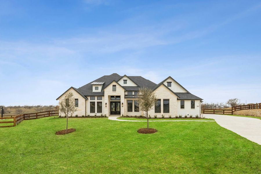 Front exterior of a home in the The Vines community, located in Haslet, TX (Image 9).