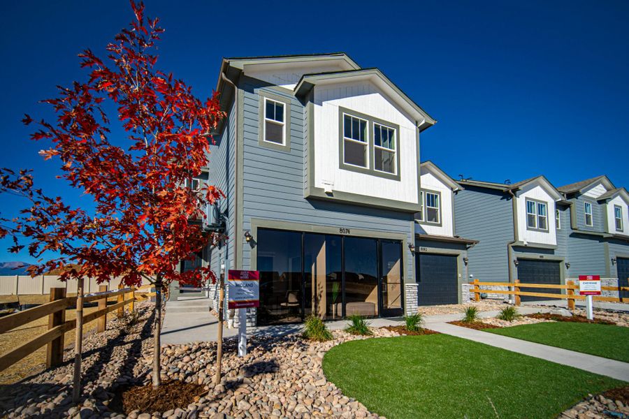 Front exterior of a home in the Aspen Meadows – Townhomes community, located in Colorado Springs, CO (Image 1). Front exterior of a home in the Aspen Meadows – Townhomes community, located in Colorado Springs, CO (Image 1).