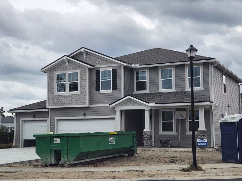 A modern two-story gray home under construction in Olde Mandarin Estates by Mattamy Homes, Jacksonville, FL. A modern two-story gray home under construction in Olde Mandarin Estates by Mattamy Homes, Jacksonville, FL.