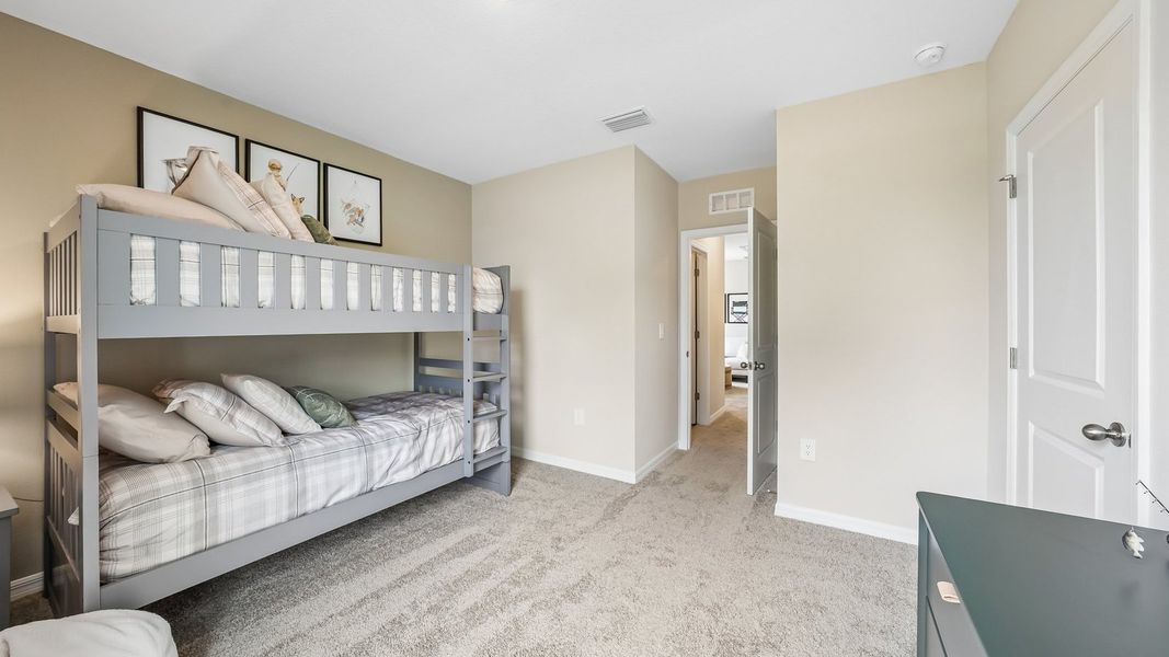 Furnished interior in a model home at Waterstone in Tampa (Image 32).