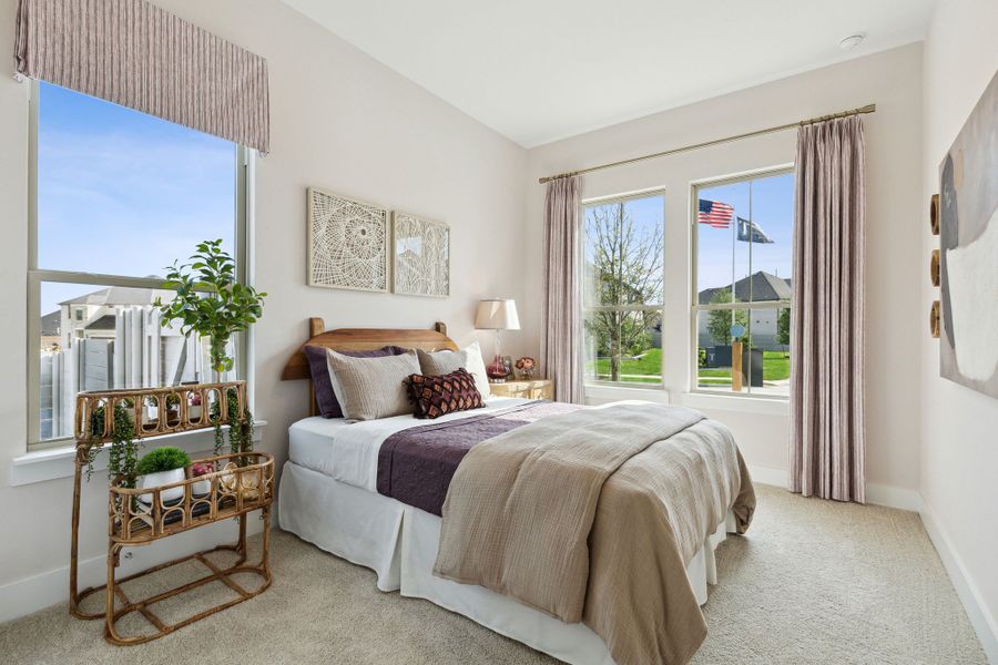 Furnished interior in a model home at Painted Tree Lakeside in McKinney (Image 50).