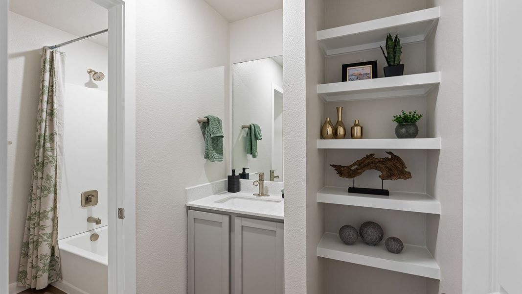 Furnished interior in a model home at King's Landing in Corpus Christi (Image 12).