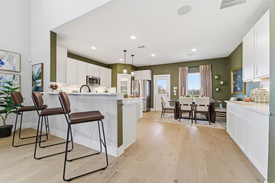 Furnished interior in a model home at Infinity Square in Kyle (Image 13).