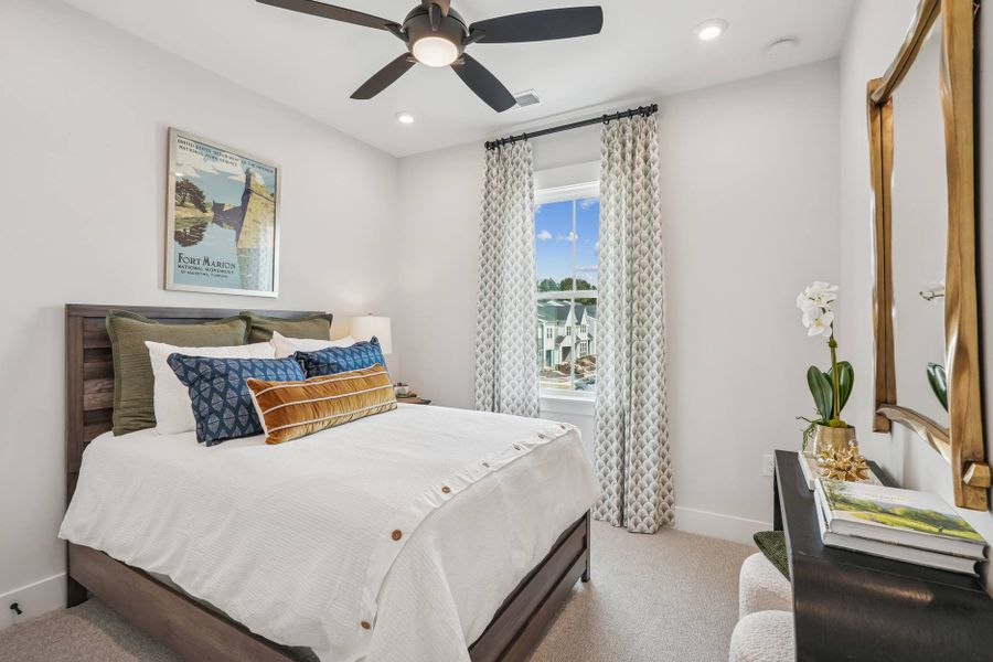 Furnished interior in a model home at Mews at Holding Village in Wake Forest (Image 42).