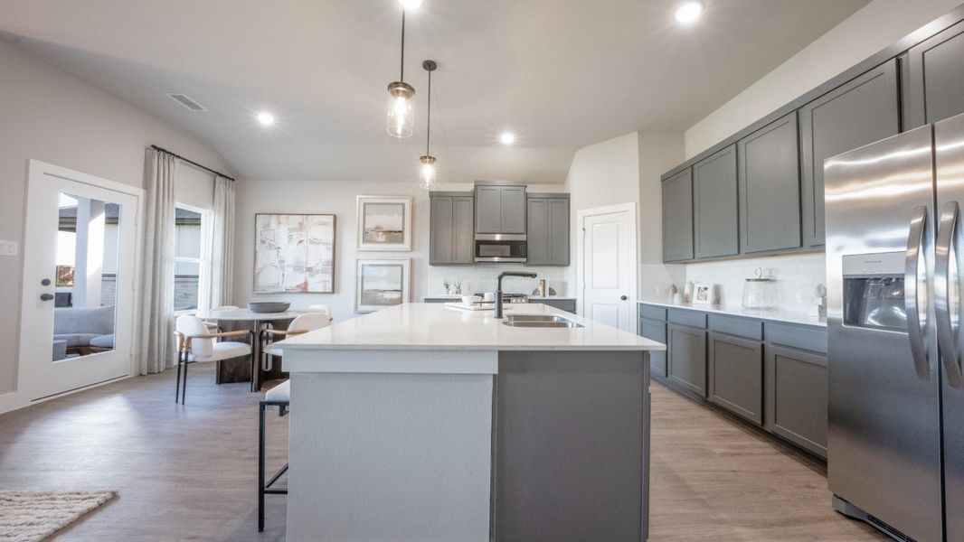 Furnished interior in a model home at Tabor Ranch in Krum (Image 5).