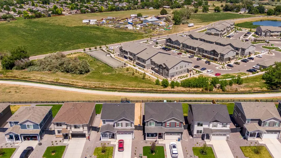Aerial view of the Westgate community in Greeley, CO, showing layout and nearby surroundings (Image 7). Aerial view of the Westgate community in Greeley, CO, showing layout and nearby surroundings (Image 7).