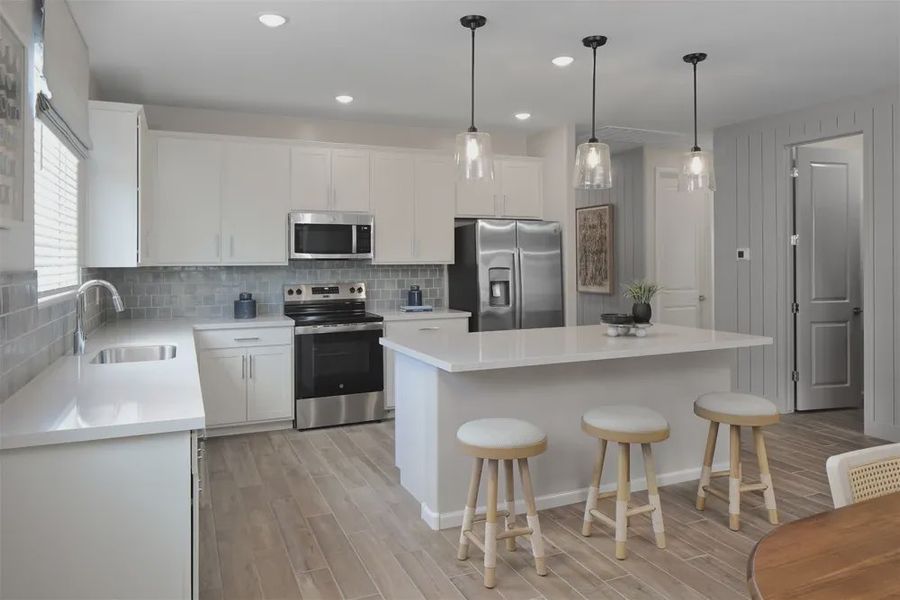 Furnished interior in a model home at Stonebridge Manor in Waddell (Image 7).