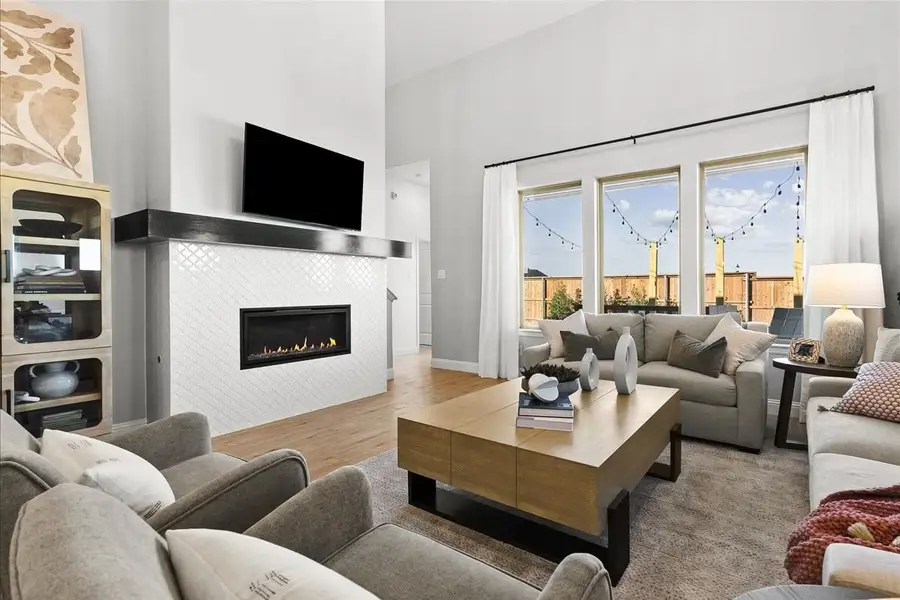 Furnished interior in a model home at Creekview Meadows in Pilot Point (Image 5).