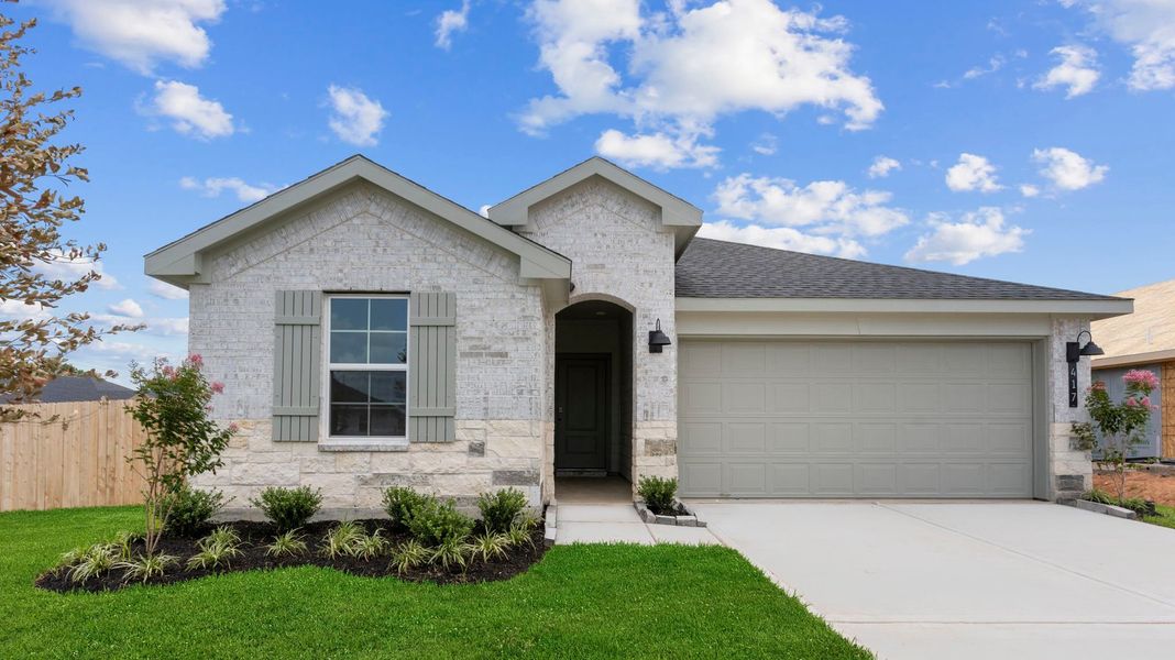 Front exterior of a home in the Riverwood Ranch community, located in Angleton, TX (Image 13).