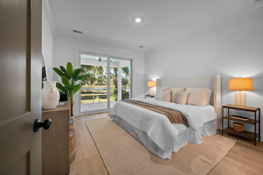 Furnished interior in a model home at Vineyard Lakes in Johns Island (Image 6).