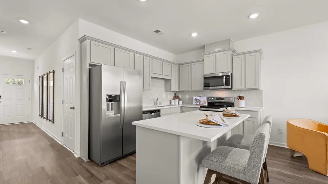 Furnished interior in a model home at The Gables at Agricultural Village in Perry (Image 2).