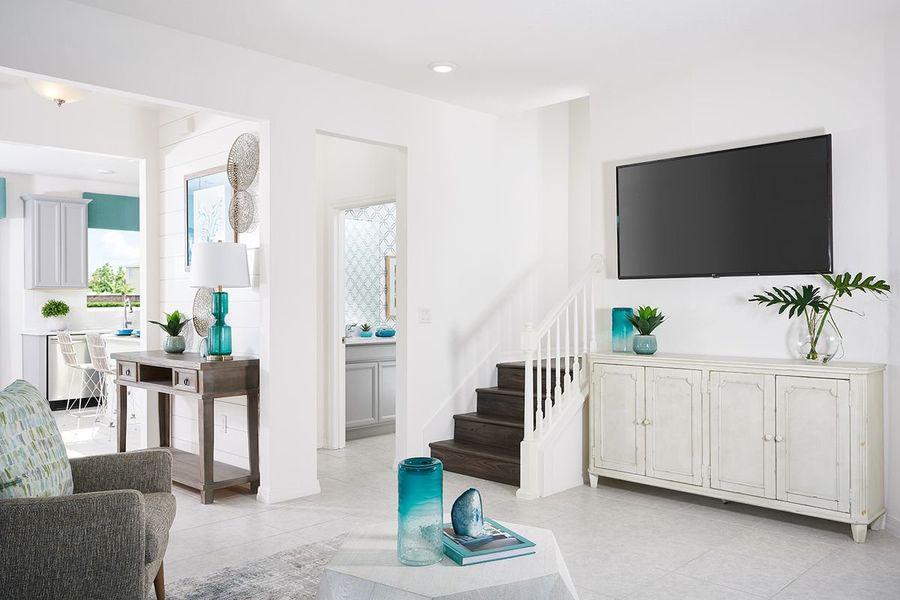 Furnished interior in a model home at Liberty Station in Orange City (Image 12).