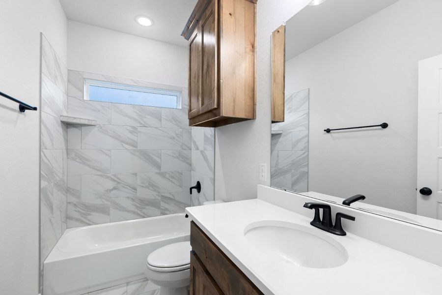 Furnished interior in a model home at Lola Creek Ranch in Boyd (Image 58).