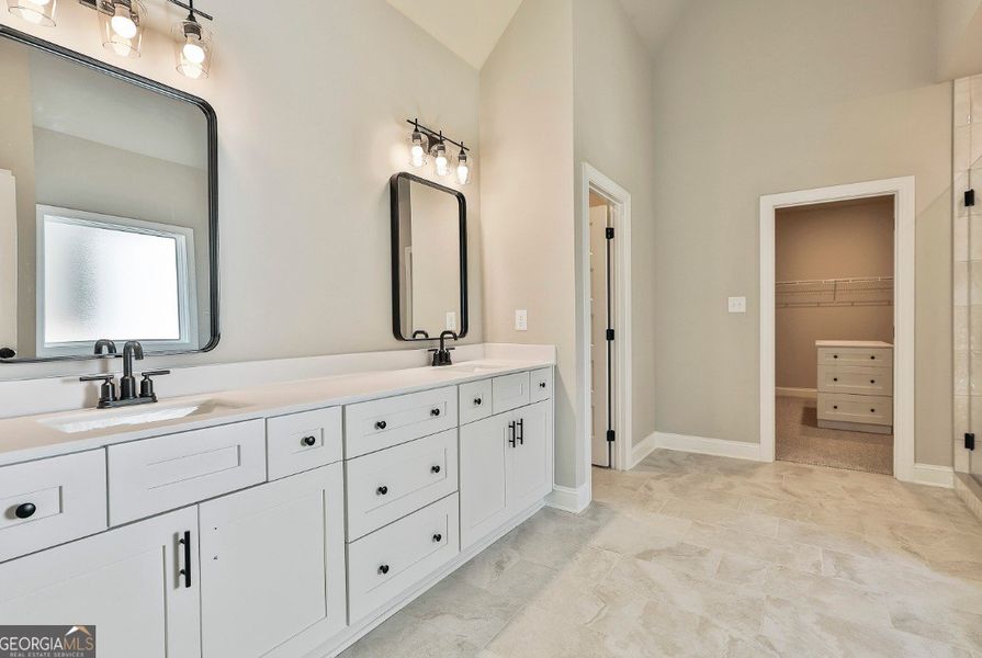 Furnished interior in a model home at Welch Farms in Senoia (Image 8).