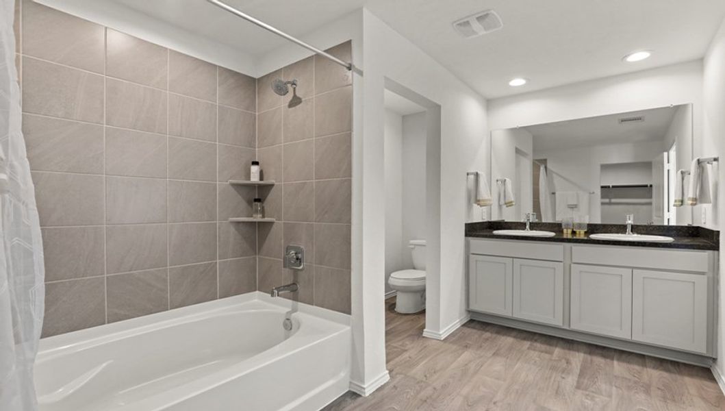 Furnished interior in a model home at Breckenridge Forest in Spring (Image 21).