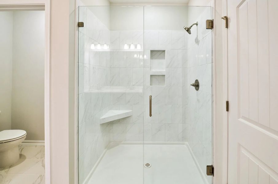 Furnished interior in a model home at Watermill in Elgin (Image 15).