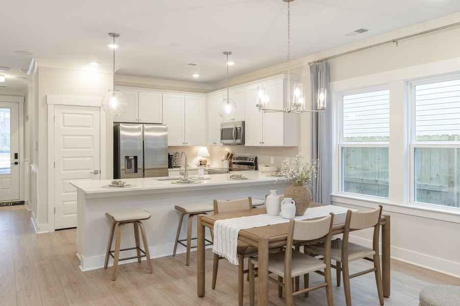 Furnished interior in a model home at Founder's Park in Summerville (Image 6).