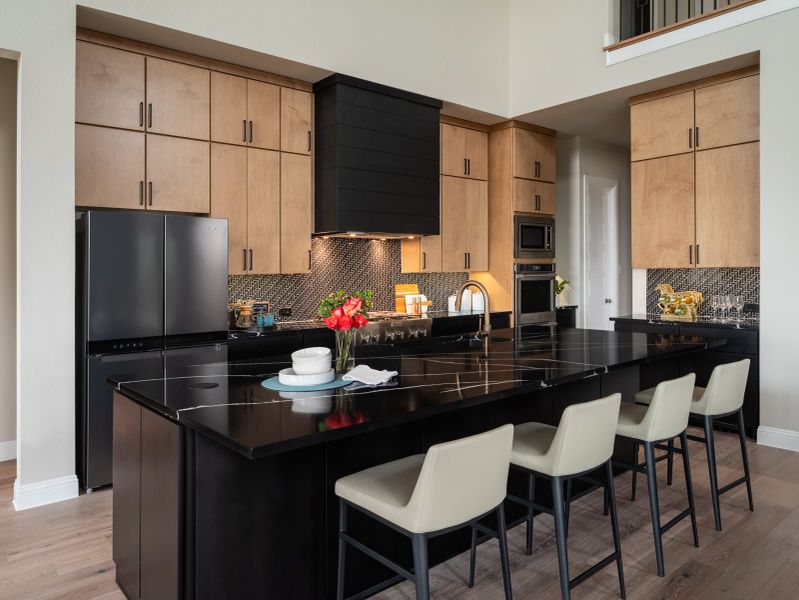 Furnished interior in a model home at Polo Ridge in Forney (Image 7).