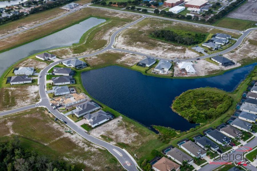 Aerial view of the River Preserve Estates community in Parrish, FL, showing layout and nearby surroundings (Image 14). Aerial view of the River Preserve Estates community in Parrish, FL, showing layout and nearby surroundings (Image 14).