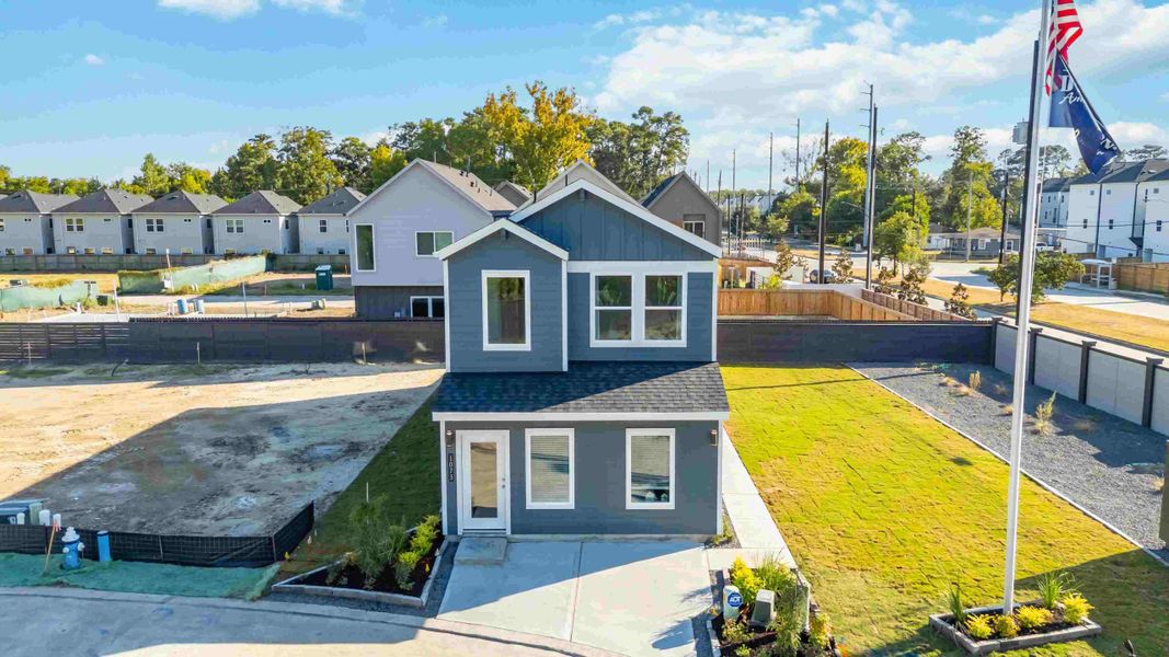Front exterior of a home in the Wheatley Oaks community, located in Houston, TX (Image 1).