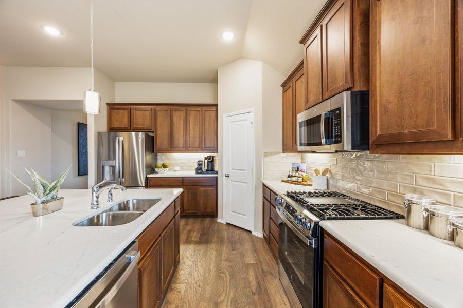 Furnished interior in a model home at Hunters Ridge in Crowley (Image 6).